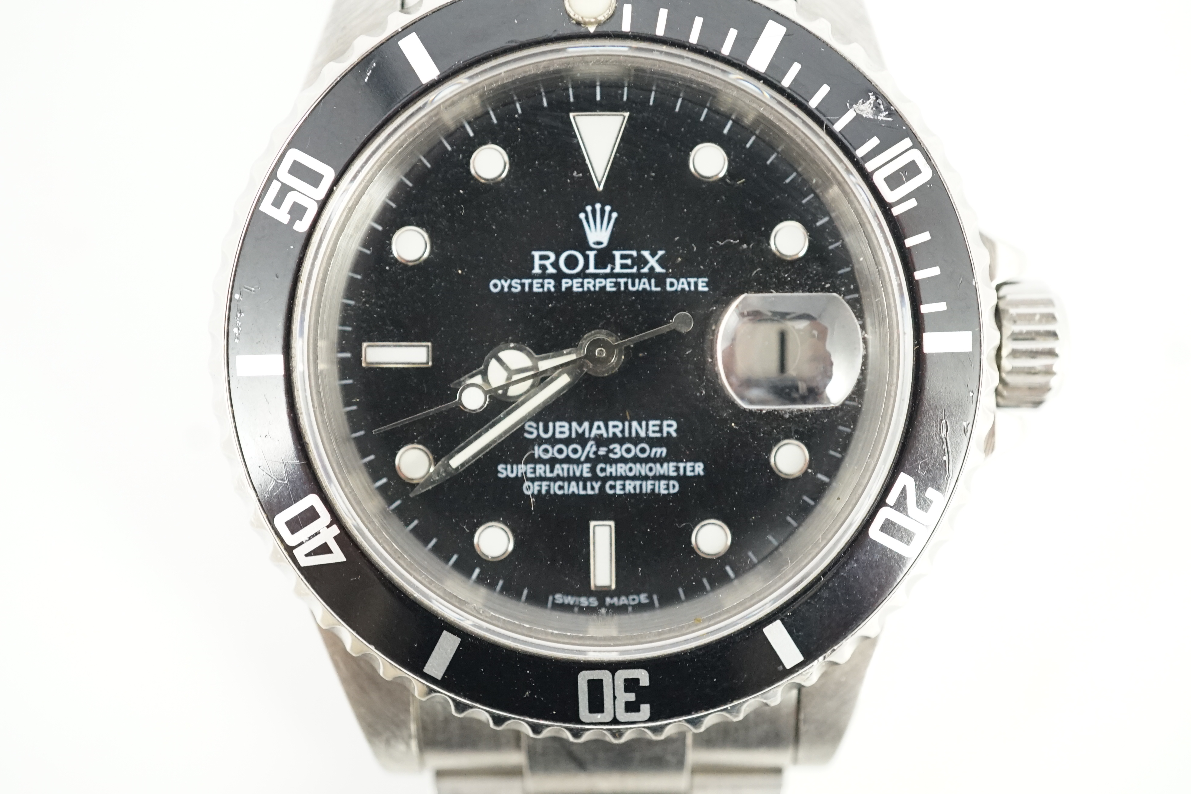 A gentleman's mid 1980's stainless steel Rolex Submariner Oyster Perpetual Date wrist watch, on a stainless steel Rolex bracelet